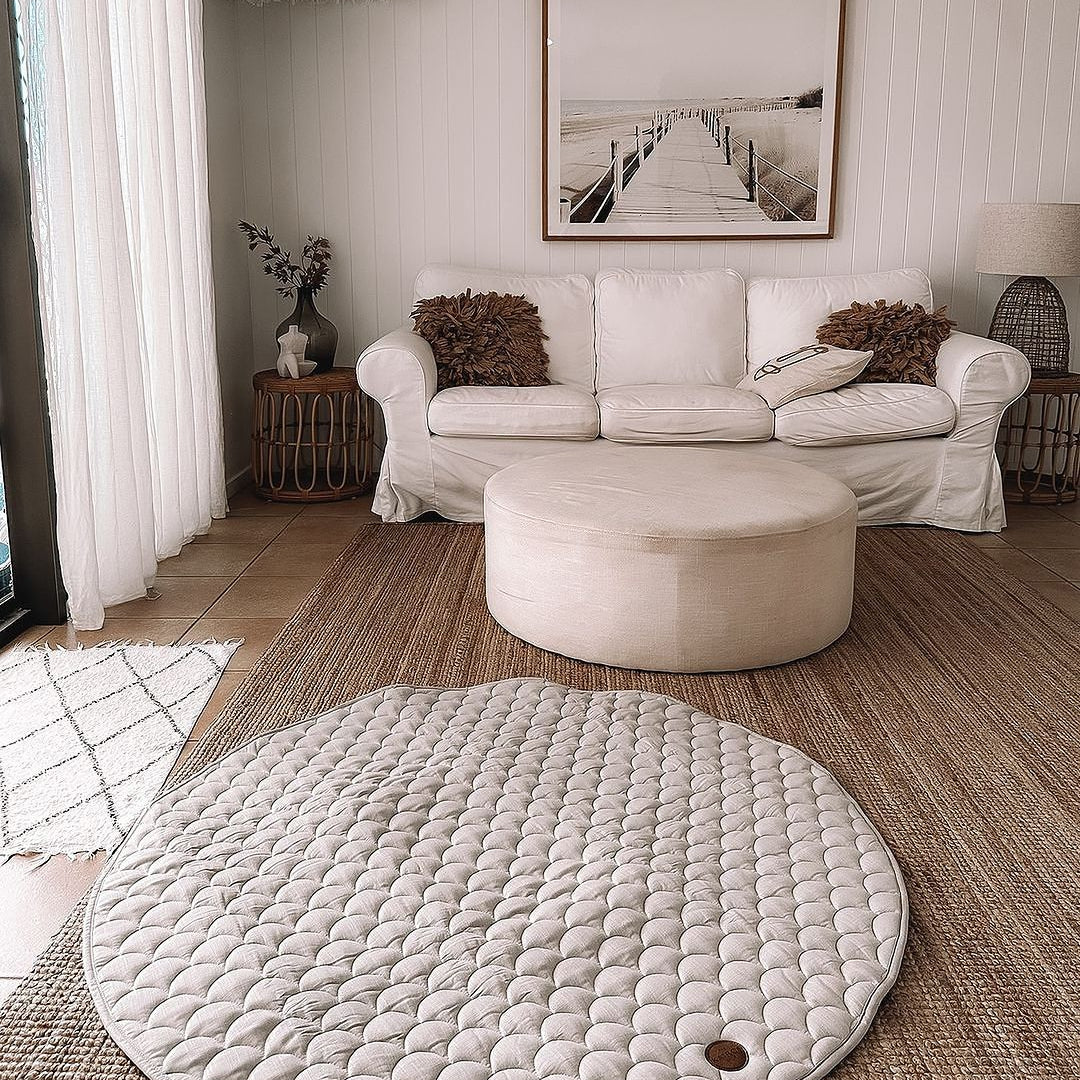Caspian play mat: luxury coastal inspired home decor with a scalloped pattern playmat