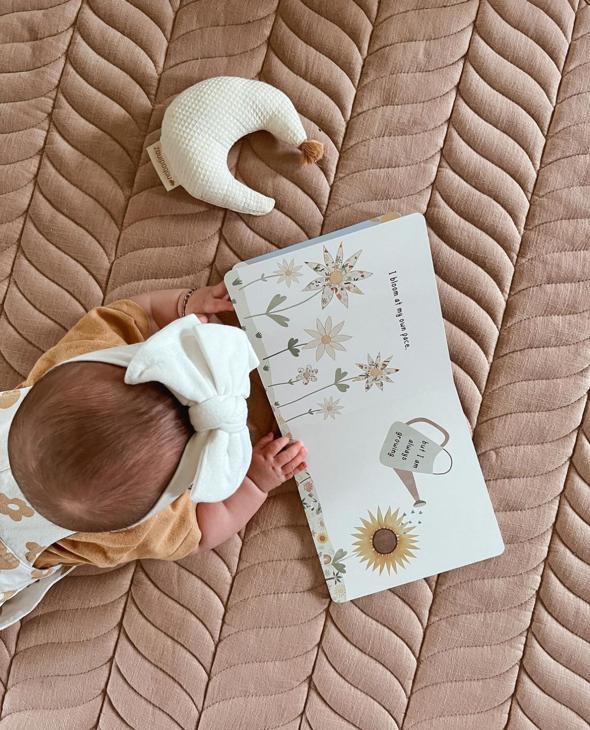 Baby tummy time on a play mat