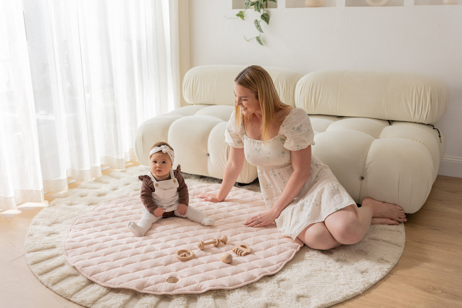 Baby on a The Positano play mat on top of a carpet. Carpet can hold up to 200,000 bacteria per sq inch, dirtier than toilet.