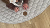 Caspian play mat with baby practising tummy time 